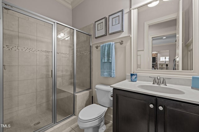 12216 Kyle Abbey Ln, Raleigh, NC 27613 - bathroom with ornamental molding, toilet, vanity, and a stall shower