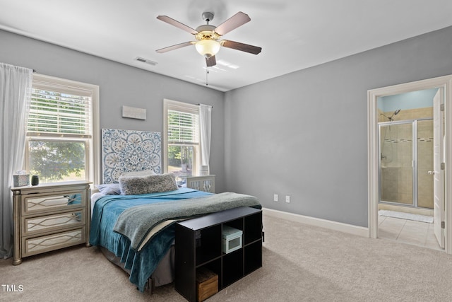 12216 Kyle Abbey Ln, Raleigh, NC 27613 - carpeted bedroom featuring a ceiling fan, baseboards, and connected bathroom