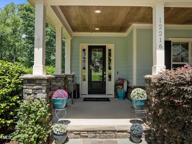 12216 Kyle Abbey Ln, Raleigh, NC 27613 - view of exterior entry featuring a porch