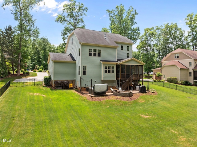 12216 Kyle Abbey Ln, Raleigh, NC 27613 - rear view of property featuring a sunroom and a shingled roof