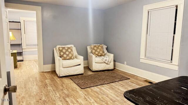 509 Cedar Creek Rd, Fayetteville, NC 28312 - sitting room with wood finished floors and baseboards