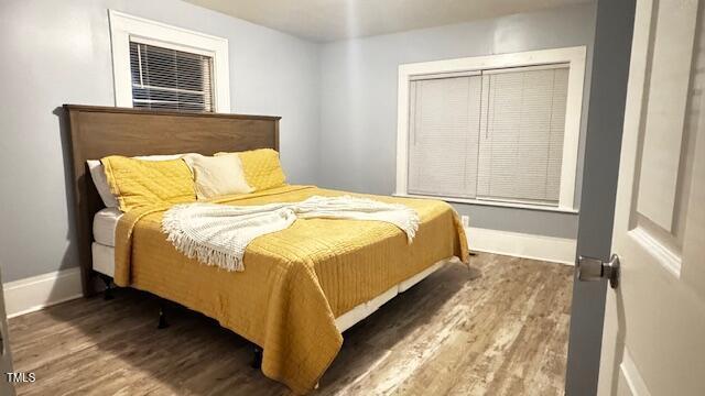 509 Cedar Creek Rd, Fayetteville, NC 28312 - bedroom with wood finished floors and baseboards