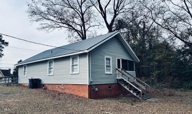 509 Cedar Creek Rd, Fayetteville, NC 28312 - view of side of home featuring crawl space and stairway