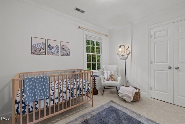 15 Gray Fox Ct, Durham, NC 27713 - carpeted bedroom featuring crown molding, a nursery area, and baseboards