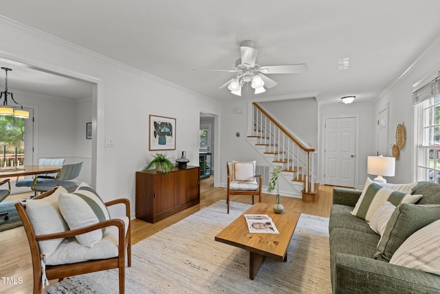 15 Gray Fox Ct, Durham, NC 27713 - living room featuring stairway, light wood-type flooring, ornamental molding, a ceiling fan, and baseboards