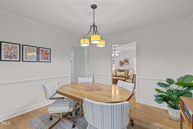 15 Gray Fox Ct, Durham, NC 27713 - dining room with crown molding, light wood-style flooring, baseboards, and a ceiling fan