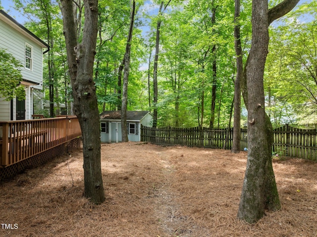 15 Gray Fox Ct, Durham, NC 27713 - fenced backyard with a deck and an outdoor structure
