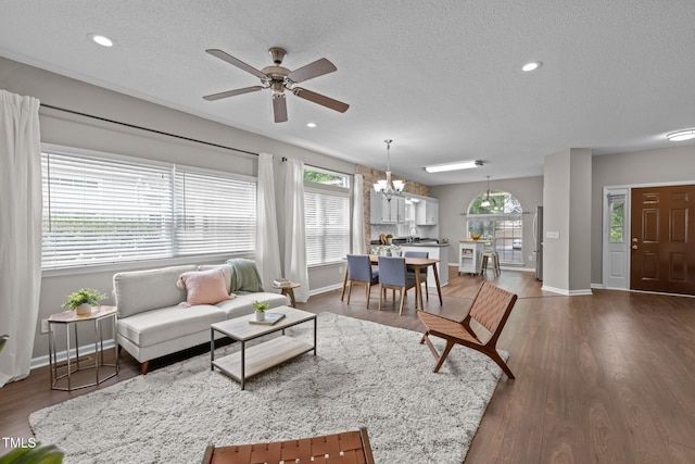 107 Covington Dr, Chapel Hill, NC 27514 - living area with a ceiling fan, a textured ceiling, a chandelier, baseboards, and dark wood finished floors