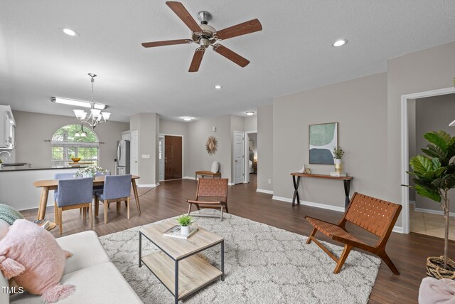 107 Covington Dr, Chapel Hill, NC 27514 - living area with ceiling fan, a chandelier, dark wood-style floors, recessed lighting, and baseboards