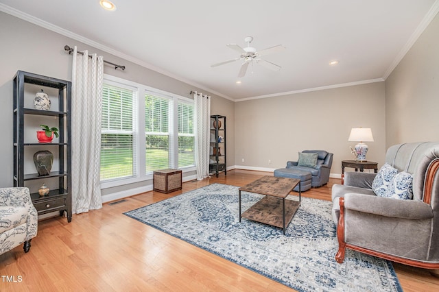 1230 Golden Bluff Ln, Fuquay Varina, NC 27526 - living area featuring a ceiling fan, wood finished floors, crown molding, baseboards, and recessed lighting