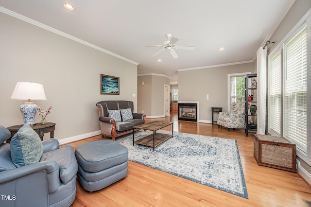 1230 Golden Bluff Ln, Fuquay Varina, NC 27526 - living room with crown molding, a ceiling fan, wood finished floors, baseboards, and recessed lighting