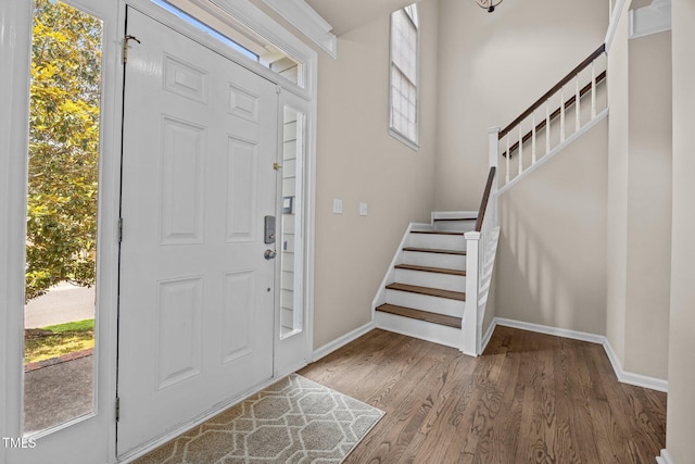 3306 Meadowrun Dr, Durham, NC 27707 - entryway with stairway and wood finished floors