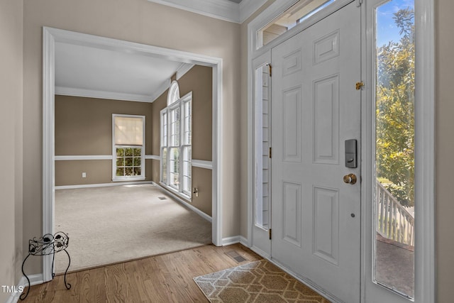 3306 Meadowrun Dr, Durham, NC 27707 - foyer featuring ornamental molding and wood finished floors