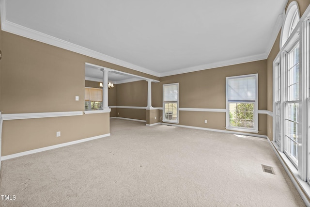 3306 Meadowrun Dr, Durham, NC 27707 - unfurnished room with crown molding, carpet floors, decorative columns, and a chandelier