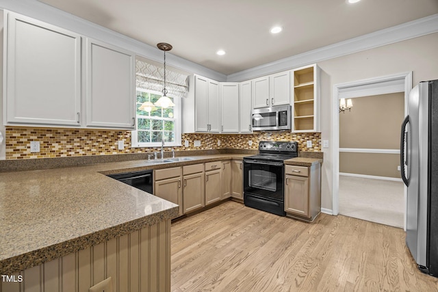 3306 Meadowrun Dr, Durham, NC 27707 - kitchen featuring appliances with stainless steel finishes, pendant lighting, light wood-type flooring, backsplash, and ornamental molding