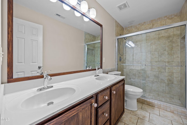 3306 Meadowrun Dr, Durham, NC 27707 - bathroom with tile patterned floors, double vanity, and a stall shower