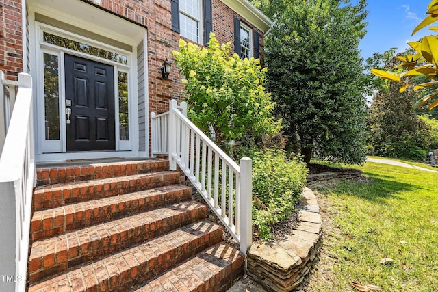 3306 Meadowrun Dr, Durham, NC 27707 - entrance to property featuring brick siding and a yard