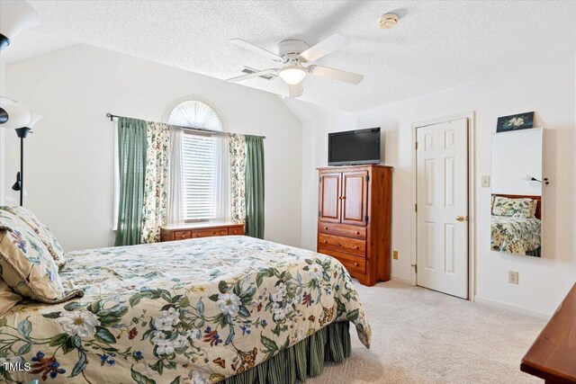 107 Canyon Run, Cary, NC 27513 - carpeted bedroom with a textured ceiling, ceiling fan, and baseboards
