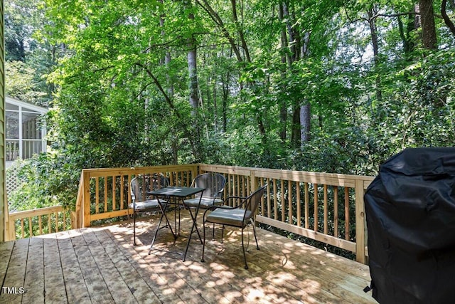107 Canyon Run, Cary, NC 27513 - wooden deck with outdoor dining area and grilling area