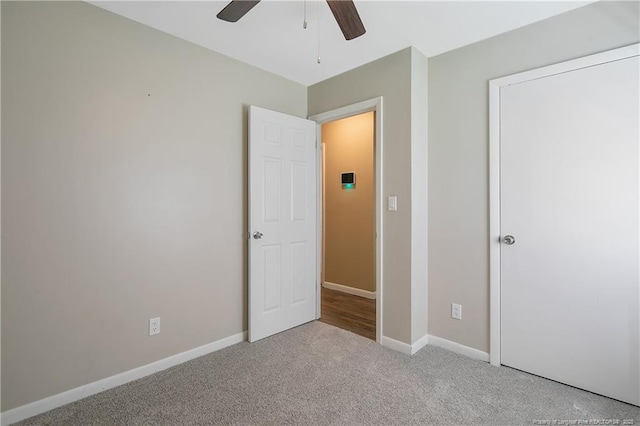 2298 Hackney Loop, Fayetteville, NC 28304 - unfurnished bedroom featuring carpet, baseboards, and ceiling fan