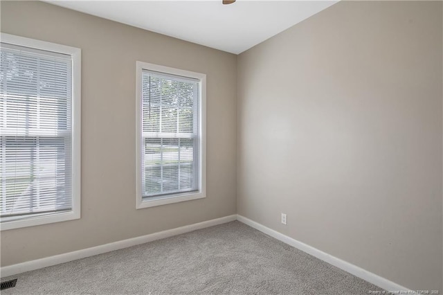 2298 Hackney Loop, Fayetteville, NC 28304 - carpeted spare room with baseboards