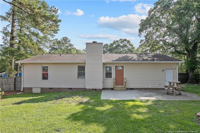 2298 Hackney Loop, Fayetteville, NC 28304 - back of house with entry steps, crawl space, a chimney, and a patio area