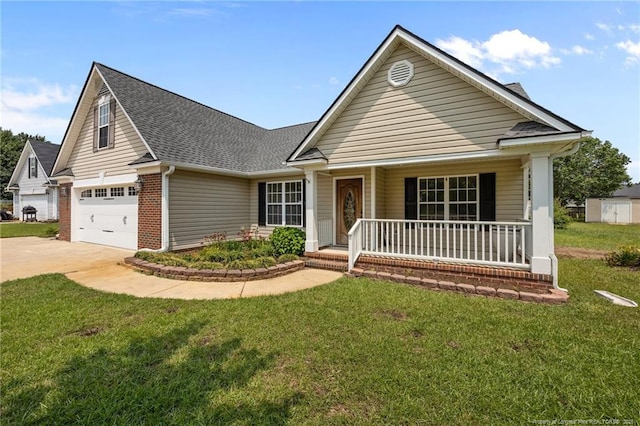 107 Hayes Ct, Raeford, NC 28376 - view of front facade with a porch, concrete driveway, a garage, and a front yard
