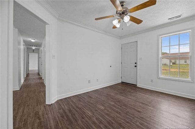 107 Hayes Ct, Raeford, NC 28376 - spare room with dark wood-style floors, ceiling fan, crown molding, and baseboards
