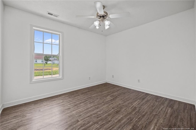 107 Hayes Ct, Raeford, NC 28376 - unfurnished room with dark wood-type flooring, baseboards, and a ceiling fan