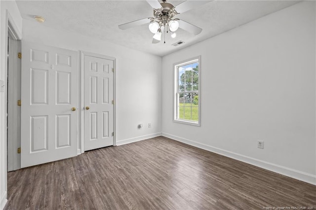 107 Hayes Ct, Raeford, NC 28376 - unfurnished bedroom featuring wood finished floors, baseboards, ceiling fan, and a closet