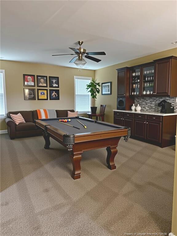 1545 Gallant Fox Ct, Parkton, NC 28371 - playroom with light colored carpet, pool table, bar, and a ceiling fan