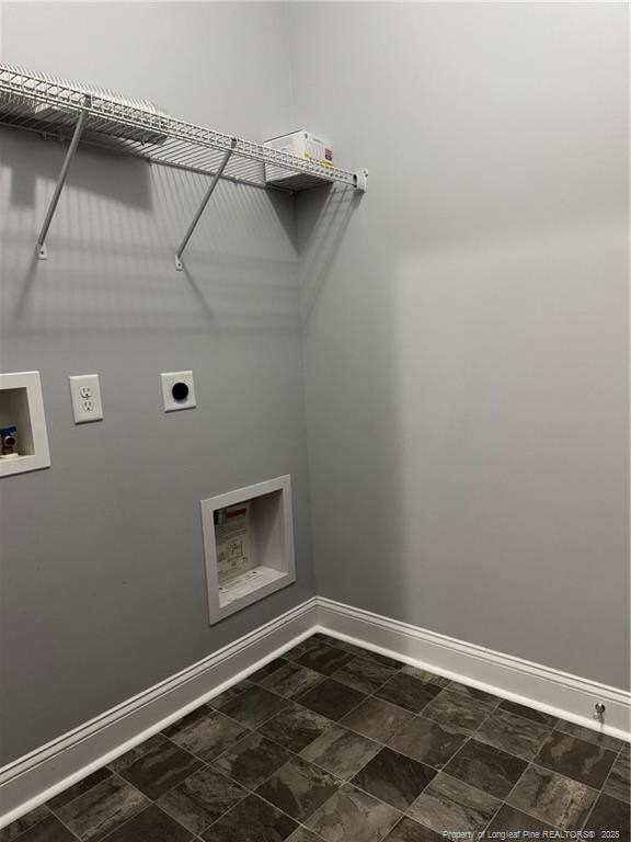 1545 Gallant Fox Ct, Parkton, NC 28371 - laundry room featuring electric dryer hookup, washer hookup, and baseboards