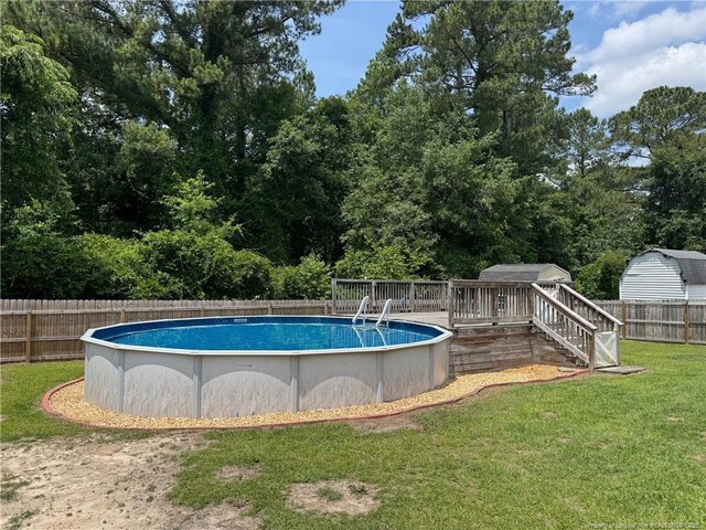 1545 Gallant Fox Ct, Parkton, NC 28371 - view of swimming pool featuring a deck