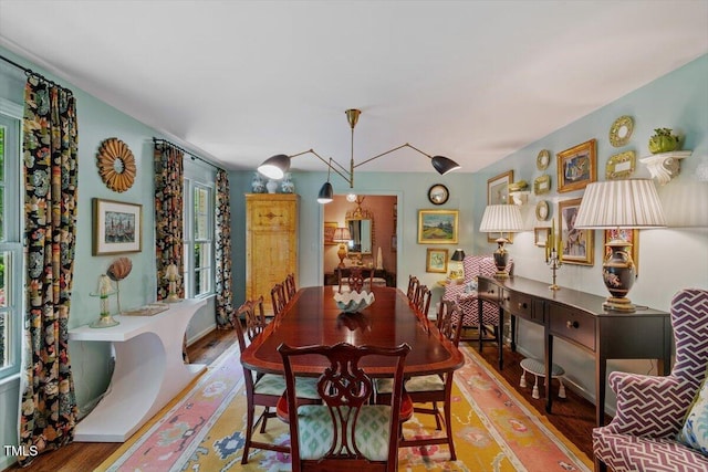 3308 Cobblestone Ct, Raleigh, NC 27607 - dining room featuring wood finished floors