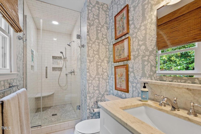 3308 Cobblestone Ct, Raleigh, NC 27607 - full bath with vanity, toilet, wallpapered walls, and a stall shower