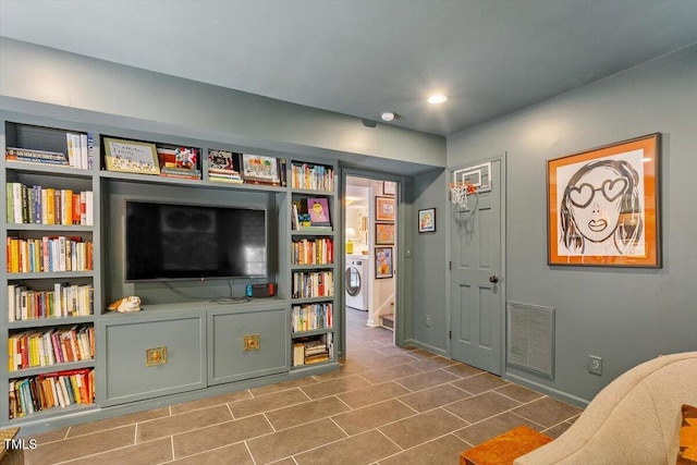 3308 Cobblestone Ct, Raleigh, NC 27607 - living area featuring washer / clothes dryer, baseboards, built in features, and recessed lighting