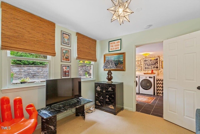 3308 Cobblestone Ct, Raleigh, NC 27607 - sitting room with washing machine and dryer, healthy amount of natural light, carpet floors, and a chandelier