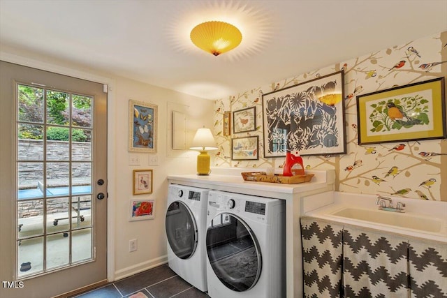 3308 Cobblestone Ct, Raleigh, NC 27607 - laundry area featuring separate washer and dryer, wallpapered walls, dark tile patterned floors, and baseboards