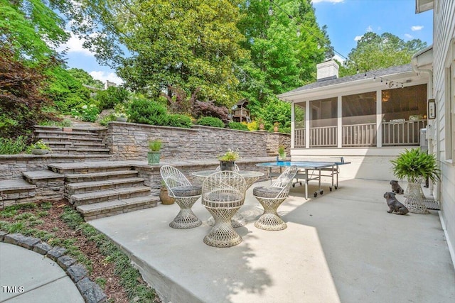 3308 Cobblestone Ct, Raleigh, NC 27607 - view of patio / terrace with a sunroom and outdoor dining area