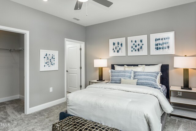 2516 Del Webb Gardens Dr, Fuquay Varina, NC 27526 - carpeted bedroom featuring a spacious closet, baseboards, a closet, and ceiling fan