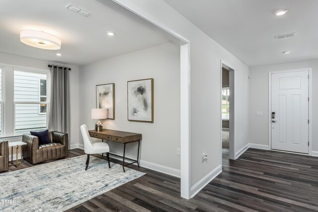 2516 Del Webb Gardens Dr, Fuquay Varina, NC 27526 - entrance foyer with dark wood-style floors, baseboards, and recessed lighting