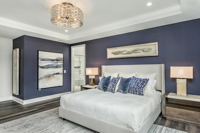 2516 Del Webb Gardens Dr, Fuquay Varina, NC 27526 - bedroom featuring wood finished floors, baseboards, a raised ceiling, recessed lighting, and ornamental molding