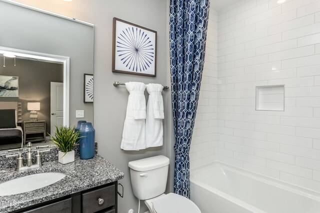 2516 Del Webb Gardens Dr, Fuquay Varina, NC 27526 - full bathroom with vanity, toilet, and shower / bathtub combination with curtain