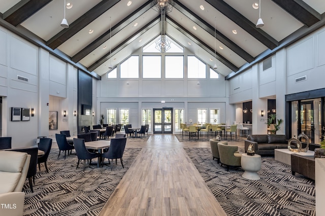 2516 Del Webb Gardens Dr, Fuquay Varina, NC 27526 - lobby featuring high vaulted ceiling, beamed ceiling, and recessed lighting