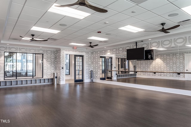 2516 Del Webb Gardens Dr, Fuquay Varina, NC 27526 - exercise area featuring a ceiling fan, wallpapered walls, wood finished floors, a paneled ceiling, and ornamental molding