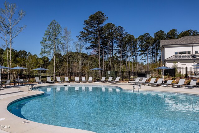 2516 Del Webb Gardens Dr, Fuquay Varina, NC 27526 - community pool with a patio