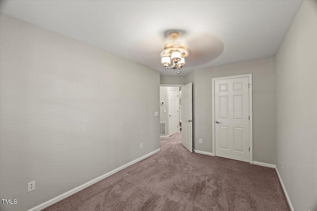 2920 Barrymore St Unit 106, Raleigh, NC 27603 - spare room featuring carpet flooring and a ceiling fan