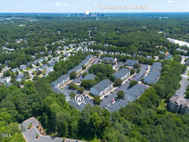 2920 Barrymore St Unit 106, Raleigh, NC 27603 - aerial overview of property's location with a heavily wooded area
