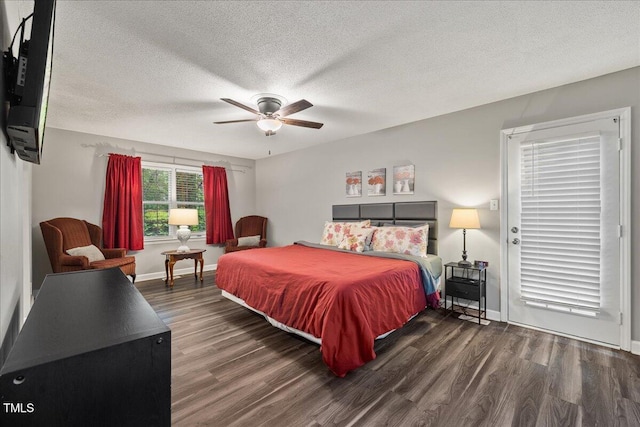 9801 Honeycutt Rd, Raleigh, NC 27614 - bedroom with wood finished floors, a textured ceiling, baseboards, and ceiling fan