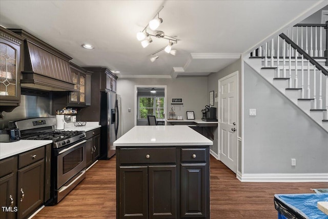 9801 Honeycutt Rd, Raleigh, NC 27614 - kitchen with appliances with stainless steel finishes, premium range hood, glass insert cabinets, light countertops, and dark brown cabinetry